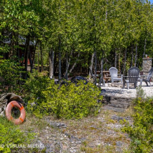 Private waterfront hangout spot with Adirondack chairs—perfect for sunsets and stargazing.