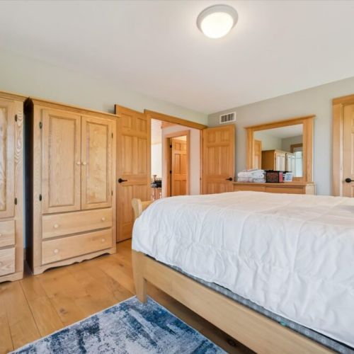 Bedroom 2: Cozy and inviting bedroom designed for restful cottage stays.