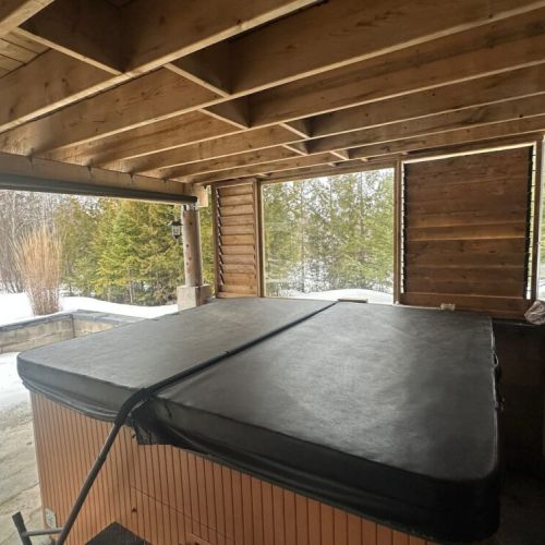 Our new enclosed area with adjustable shutters offers shelter from Lake Huron winds. Open or close them to set the perfect atmosphere while you relax in the tub.