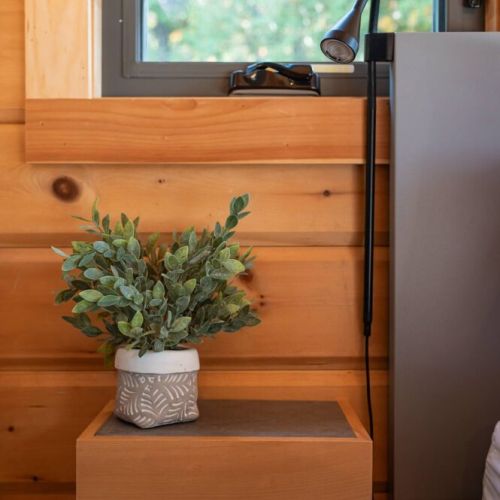 Thoughtful touches bring warmth and charm to every corner of the bedroom.