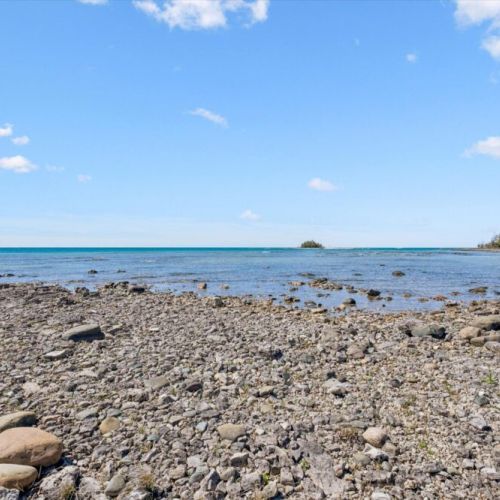 Spend your days exploring the property's natural rocky shoreline and enjoy the peaceful beauty of Lake Huron right at your doorstep.