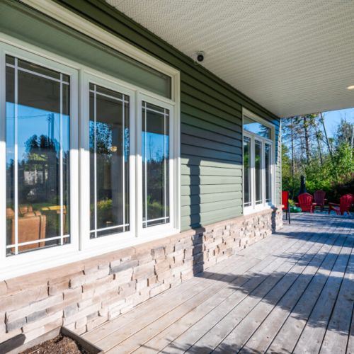 Start your mornings on the shaded front porch or stroll toward the fire pit for a relaxing evening. A peaceful outdoor space perfect for slow travel and scenic Bruce Peninsula escapes.