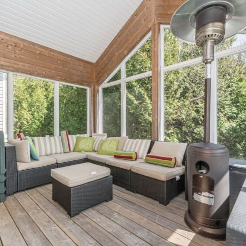 The screened in Peninsula Room is perfect for dining outside without being annoyed by bugs.