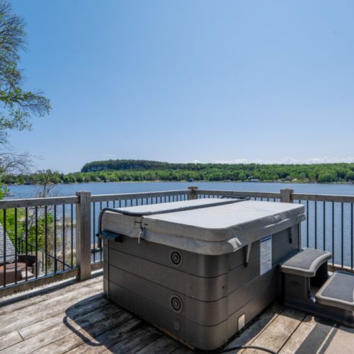 Relax in the hot tub with panoramic views of the bay and Niagara Escarpment.
