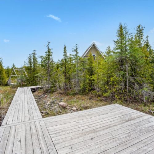 Enjoy dockside tranquility on this spacious landing at the edge of a calm channel leading into Dorcas Bay.