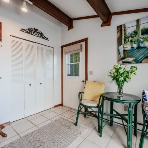 The inviting entryway sets the tone for your stay with cozy seating and thoughtful touches. A perfect spot to kick off your shoes after exploring Lion’s Head or Bruce Peninsula National Park.
