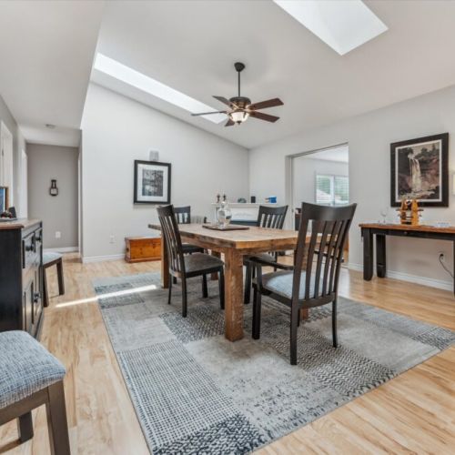Share meals, play board games, or gather for a late-night chat at this beautiful rustic dining table bathed in natural light.