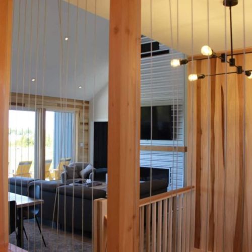 Modern light fixtures throughout the home cast a calming glow on the living spaces.
