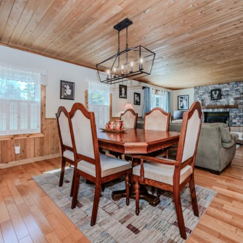 Gather around the wood-accented dining space for memorable meals with family and friends—perfect for slow travel and holiday feasts.