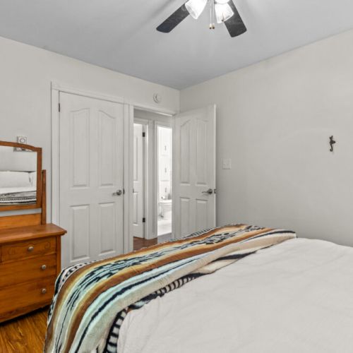 Cozy queen bedroom designed for a restful night's sleep.