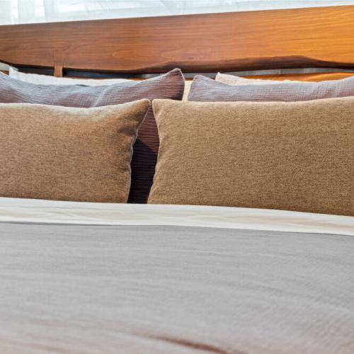Thoughtful details and soft, comfortable bedding create a welcoming place to settle in for a restful night.