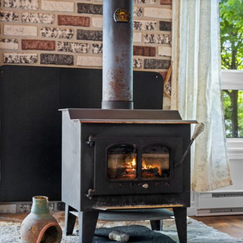 Cozy up by the wood-burning stove after a day of Bruce Peninsula adventures.