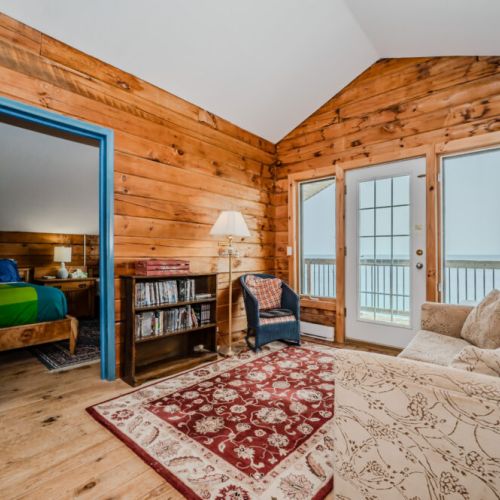 This cozy nook offers a perfect spot to relax with a book while soaking in the stunning lake scenery.