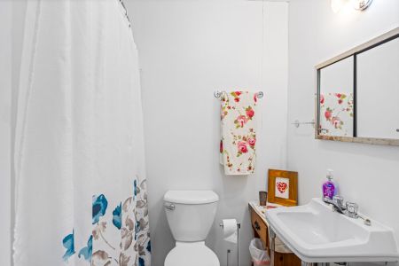 The updated full bathroom includes a shower/tub combination and all the essentials for your stay.