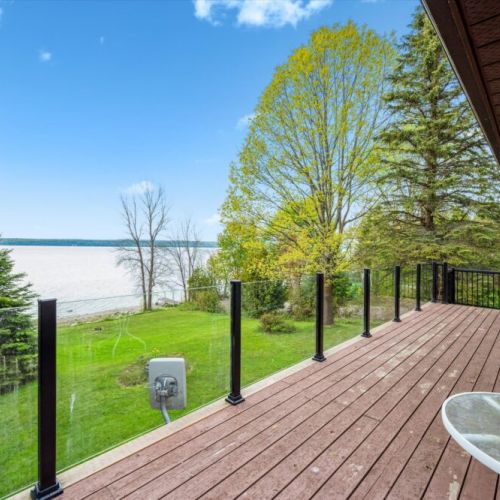 Enjoy seamless indoor-outdoor living from the upper-level walkout – ideal for gatherings, grilling, and soaking in the scenic views of Georgian Bay.