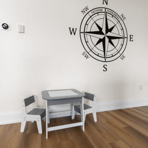 A dedicated kids' table provides the perfect spot for games, crafts, or snacks.