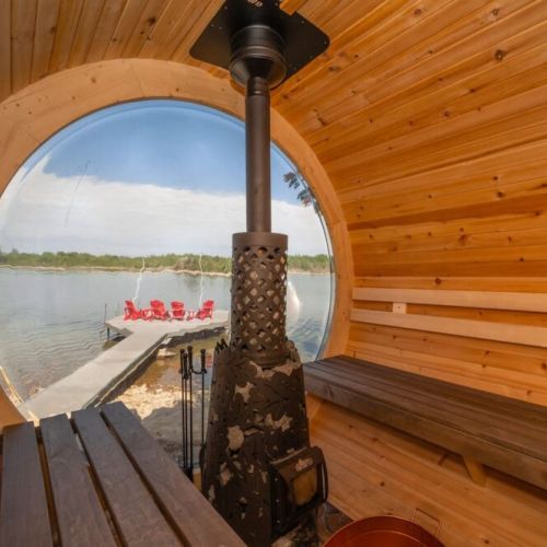 Rest and renew in the cedar barrel sauna with a view of Lake Huron.