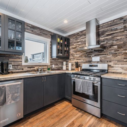 Modern kitchen with stainless steel appliances and everything you need to cook and entertain with ease.