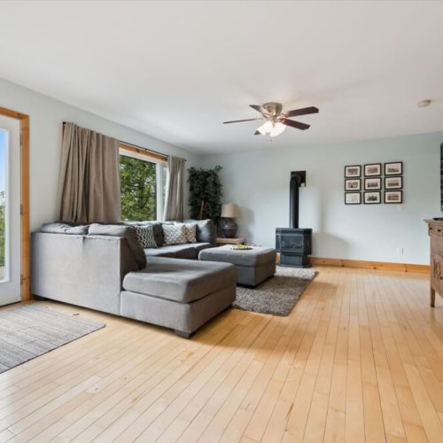 The cozy seating area is perfect for movie nights or unwinding after a day on the lake.
