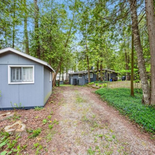 The welcoming path to Summer Side includes extra space for storage and gear, perfect for adventure-ready families and explorers.