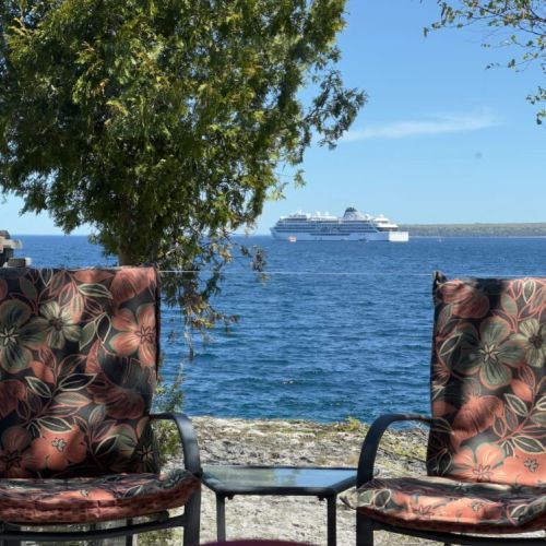 Enjoy a unique view of the cruise ships that make weekly visits to Big Tub Harbour during the summer months.