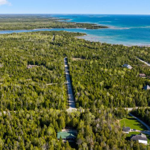 A world of your own. Looking out over miles of secluded forest, quiet roads, and the ultimate playground of open water.