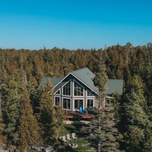 Nestled among evergreens—secluded luxury with unmatched privacy.