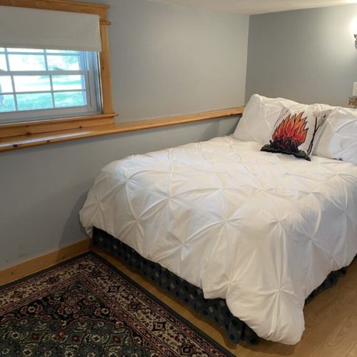Bedroom 3: Cozy lower-level bedroom with a quiet, tucked-away feel