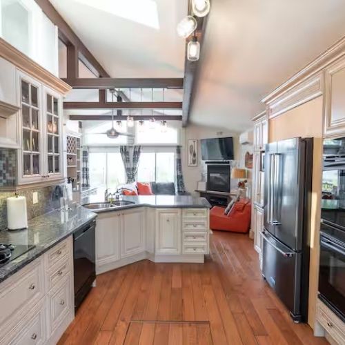 The chef’s kitchen, complete with stainless steel appliances and all the essentials for preparing meals at home.