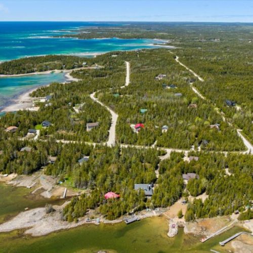 Scenic aerial view of the Bradley Harbour area, showcasing the breathtaking shoreline and tranquil waterfront surroundings.
