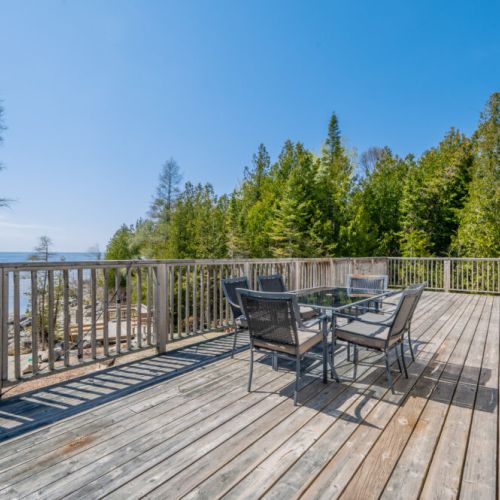Comfortable patio furniture with cushions.