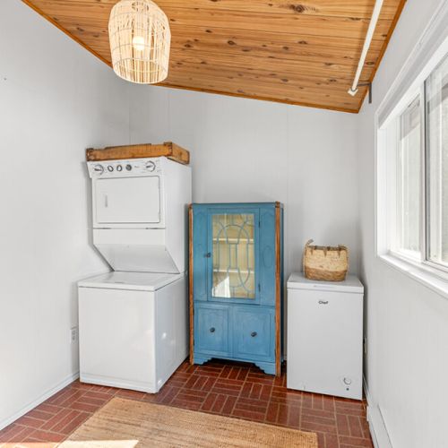 Convenient laundry room with in-suite washer & dryer, plus extra storage for longer stays.