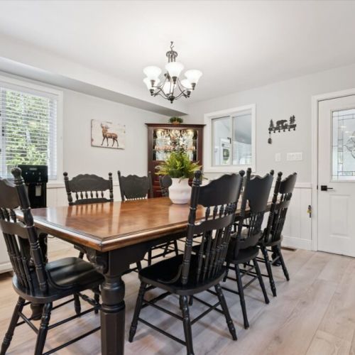 Spacious dining area with seating for the whole group — perfect for shared meals, games, and gatherings.