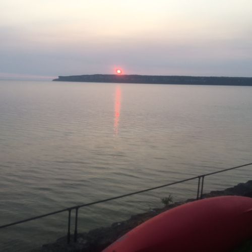 Peaceful sunset reflections across the bay.