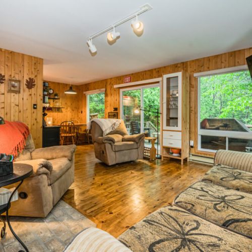 An incredibly cozy and rustic living area perfect to enjoy quality time with friends and family.