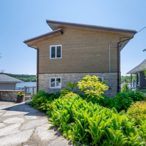 Beautiful landscaping and natural greenery surrounding the property.