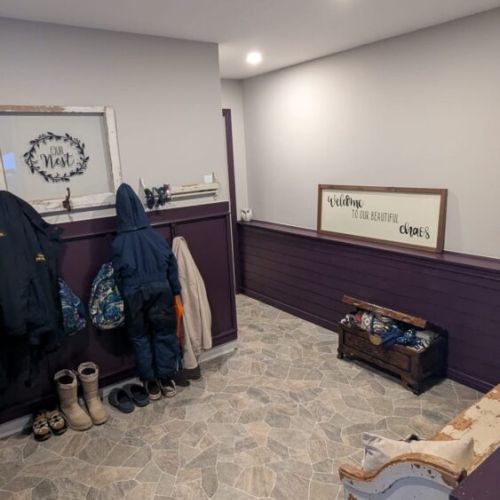 Spacious entry area with coat hooks and storage — perfect for boots and gear after outdoor adventures.