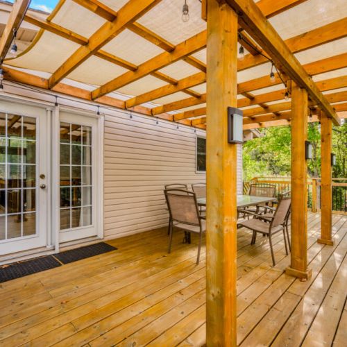 The deck is the perfect spot to enjoy the outdoors, whether you're dining, lounging, or simply soaking in the serene surroundings.