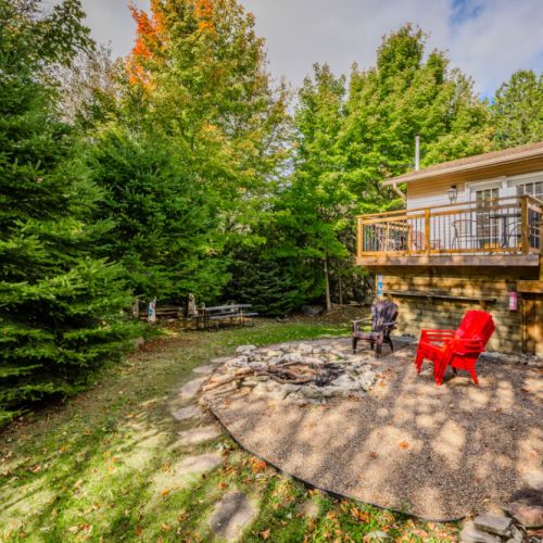 The deck is the perfect spot to enjoy the outdoors, whether you're dining, lounging, or simply soaking in the serene surroundings.