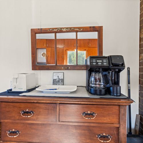 Start your morning at the dedicated coffee station, conveniently set up just steps from the kitchen and dining area.