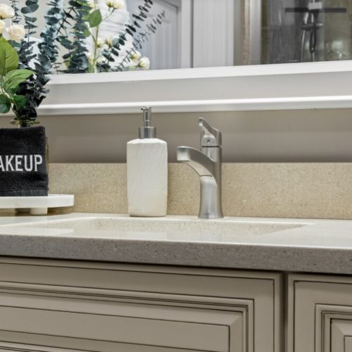 A spacious bathroom vanity offers plenty of room to get ready for the day.