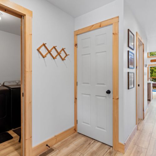 The entryway provides easy access to the laundry room and plenty of space to come and go comfortably.