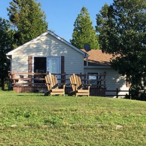 Welcome to your lakeside getaway, with a sunny deck perfect for morning coffee