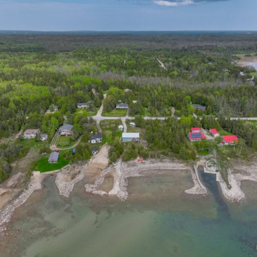 Steps from the lake! This serene cottage offers unbeatable access to the shoreline and forested surroundings—ideal for kayaking, hiking, and relaxation.