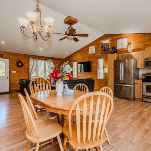The open kitchen with modern appliances and ample space for cooking and socializing with family and friends.