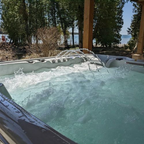 Enjoy a relaxing soak as you watch the sunset from DeLana's high-end hot tub. Let the power jets massage your back as you forget about life for. awhile.