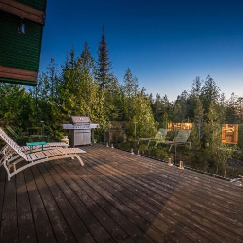 Paradise Pines blends rustic charm with modern comfort in a peaceful waterfront setting.