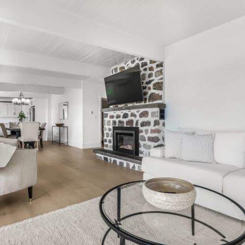 The main floor flows beautifully from living to dining to kitchen so everyone can stay together.