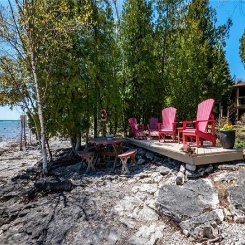 Enjoy relaxing in the Muskoka chair lounge at DeLana to enjoy a book, watch the kids play, or simply chill.