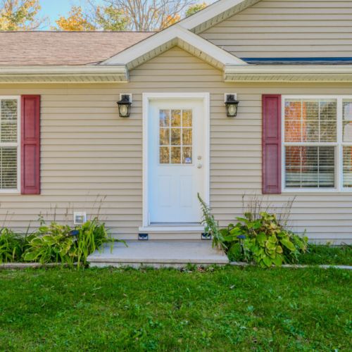 Welcome to Maple Cottage, where comfort and tranquility await you. A warm and inviting entry with beautifully landscaped surroundings.
